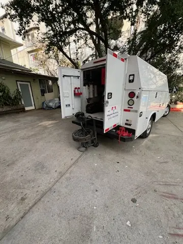 Magnet Plumbing service vehicle on-site for Grease Trap Cleaning in Boca Raton Hills